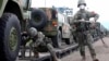 In this handout photo taken from video released by Russian Defense Ministry Press Service on Aug. 29, 2022, Chinese soldiers arrive at Grodekovo railway station to participate in war games drills in Grodekovo, Russia. (Russian Defense Ministry Press Service via AP)
