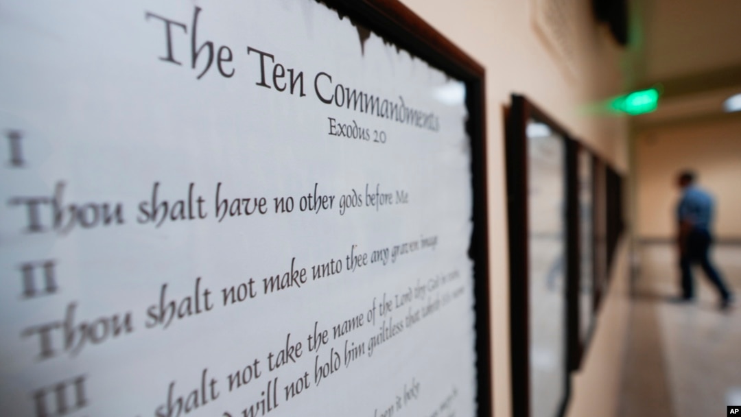 FILE - The Ten Commandments are posted with other documents in the Georgia Capitol, June 20, 2024, in Atlanta. Civil liberties groups sued June 24, challenging Louisiana’s requirement that the Ten Commandments be displayed in public school classrooms.