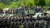 FILE - Fighters from the Lebanese militant group Hezbollah carry out a training exercise in Aaramta village in the Jezzine District, southern Lebanon, May 21, 2023. 