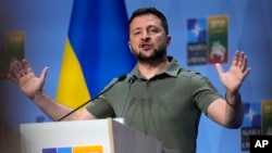 FILE - Ukraine's President Volodymyr Zelenskyy addresses a media conference at a NATO summit in Vilnius, July 12, 2023.
