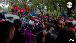 ARCHIVO - Empleados públicos participan en una manifestación de apoyo a Daniel Ortega