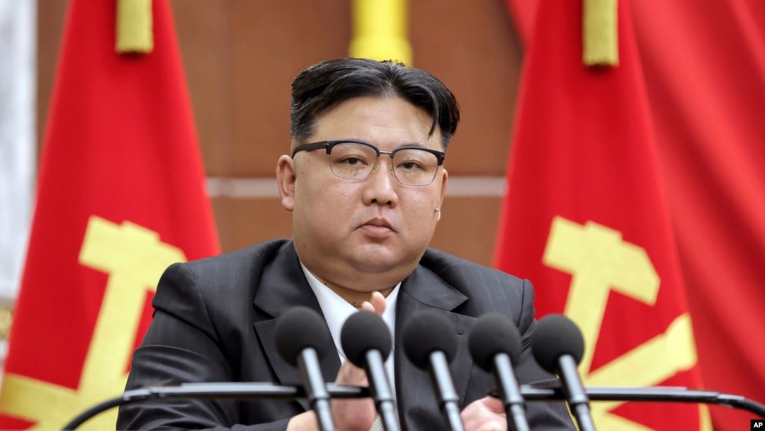 In this photo provided by the North Korean government, North Korean leader Kim Jong Un delivers a speech during a year-end plenary meeting of the ruling Workers’ Party, which was held between Dec. 26, and Dec. 30, 2023, in Pyongyang, North Korea. 