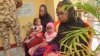 Recently freed Chibok schoolgirls, now 26 years old, with their children are photographed at the Army Maimalari Cantonment in Maiduguri, Nigeria, May 4, 2023. 