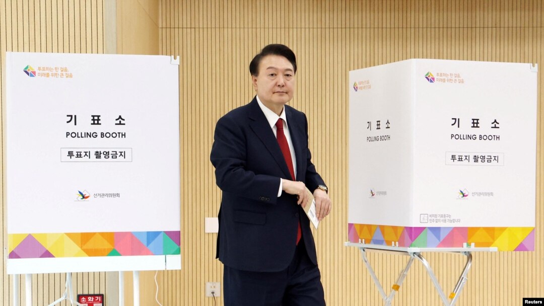 FILE - South Korean President Yoon Suk Yeol casts his early vote for 22nd parliamentary election, in Busan, South Korea, April 5, 2024. (Yonhap via Reuters)