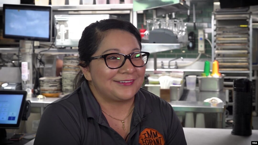 Alba Galdamez, an immigrant from El Salvador, is the chef at the Immigrant Food Restaurant's White House location. (Screen grab from video by Saqib Ul Islam/VOA)