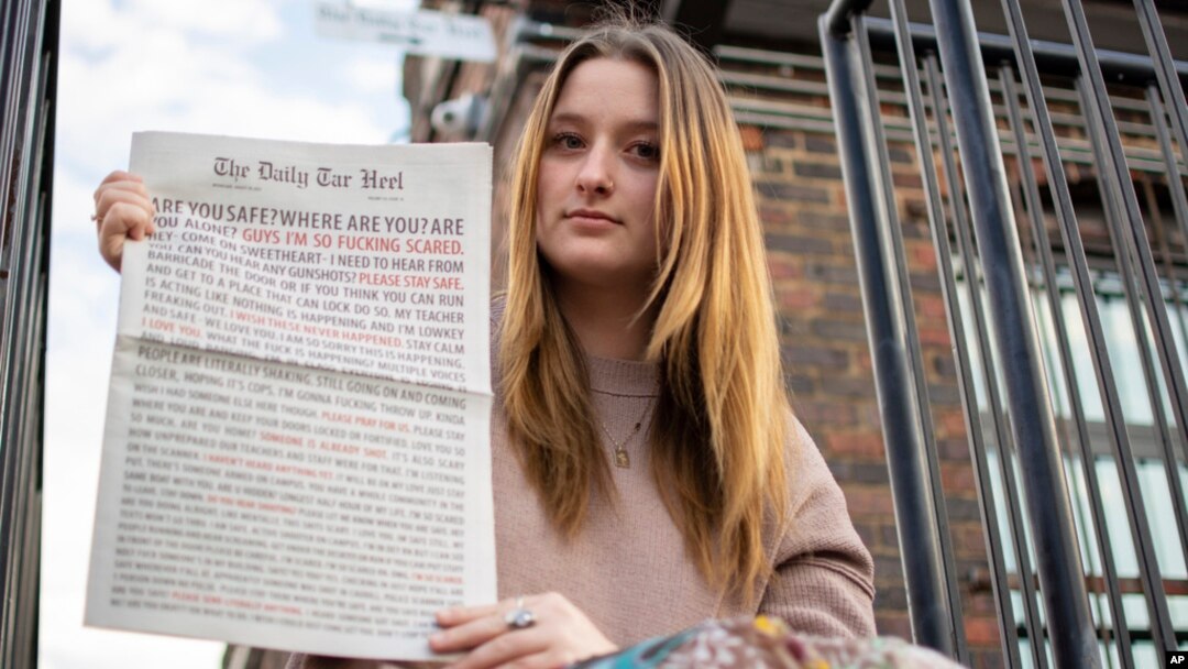 Emmy Martin, editor in chief of The Daily Tar Heel, the student newspaper of the University of North Carolina at Chapel Hill, poses with a copy of the Aug. 30 paper outside of the newsroom on Oct. 9, 2023, in Chapel Hill, NC. 