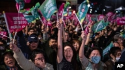 The crowd cheers at a Democratic Progressive Party rally in Taipei, Taiwan, Jan. 13, 2024. The ruling DPP party candidate Lai Ching-te emerged victorious in Taiwan’s presidential election.