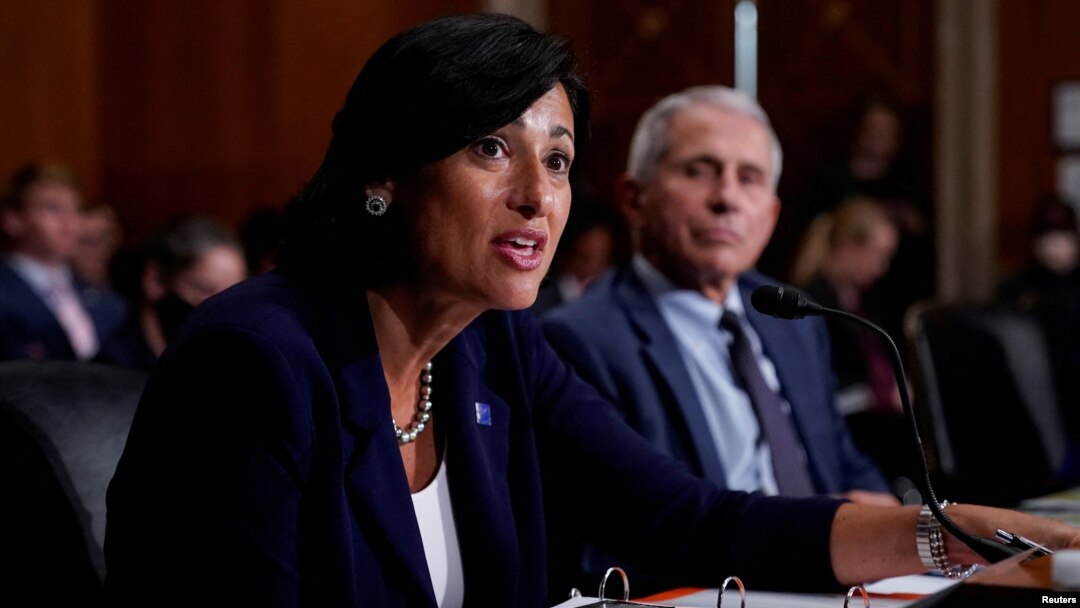 FILE - Dr. Rochelle Walensky, director of the Centers for Disease Control and Prevention (CDC), and top infectious disease expert Dr. Anthony Fauci, testify before the Senate Health, Education, Labor, and Pensions Committee in Washington, D.C., July 20, 2021.