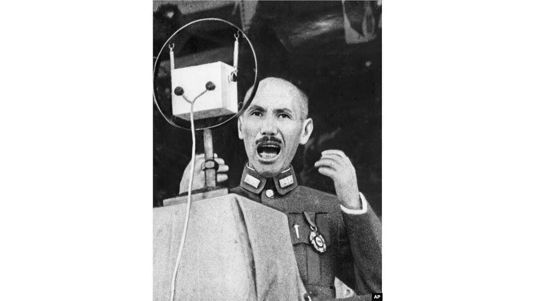 FILE - Gen. Chiang Kai-shek, Chinese strongman, delivers a stirring appeal to his people by radio in an undated photo.