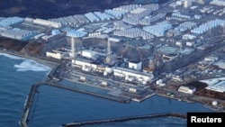 ARCHIVO - Una vista aérea muestra la planta de energía nuclear Fukushima Daiichi luego de un fuerte terremoto, en la ciudad de Okuma, prefectura de Fukushima, Japón, en esta foto tomada por Kyodo el 17 de marzo de 2022. (Kyodo/vía Reuters)
