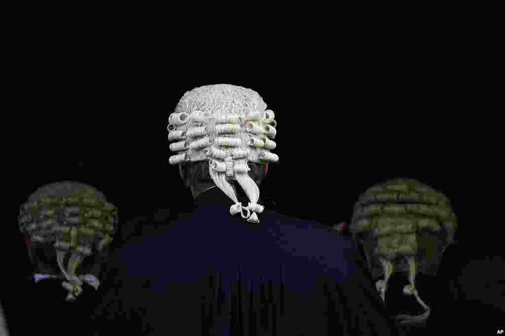 Judges walk into Parliament after a service at Westminster Abbey for the opening of the new legal year in London.