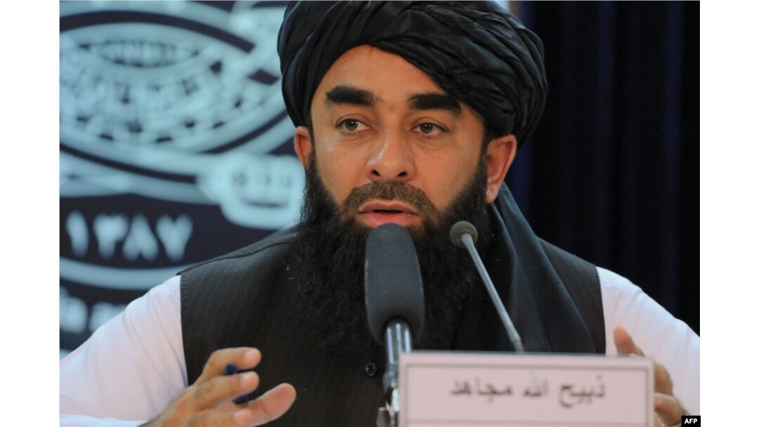 FILE - Taliban spokesman Zabihullah Mujahid speaks during a press conference in Kabul, Nov. 5, 2022.