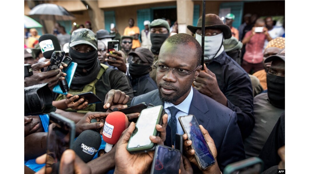 FILE - Ousmane Sonko, president of the opposition party Senegalese Patriots for Work, Ethics and Brotherhood (PASTEF), gives a press statement, in Ziguinchor, Senegal, July 3, 2022.