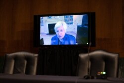 FILE - Janet Yellen, President-elect Joe Biden's nominee for Secretary of the Treasury, participates remotely in a Senate Finance Committee hearing in Washington, Jan. 19, 2021.