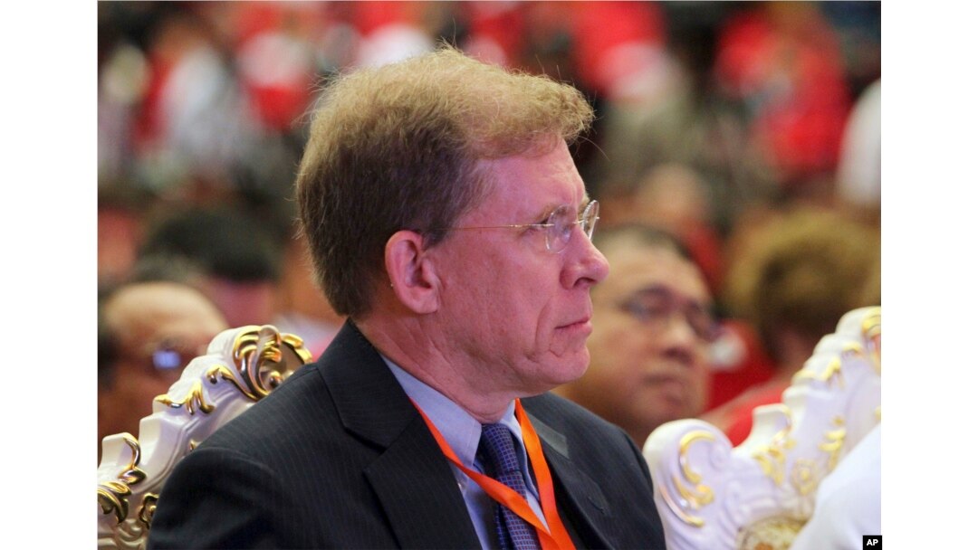 U.S. Deputy Assistant Secretary for Southeast Asia W. Patrick Murphy listens to Myanmar's leader Aung San Suu Kyi's televised speech to the nation at the Myanmar International Convention Center in Naypyitaw, Myanmar, Sept. 19, 2017.