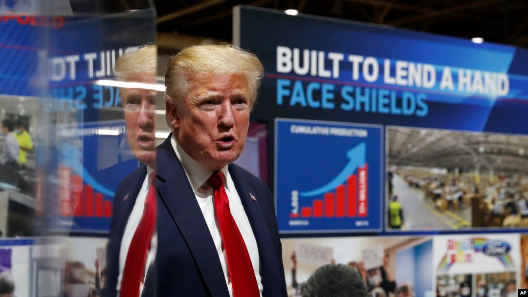 President Donald Trump speaks as he tours Ford's Rawsonville Components Plant that has been converted to making personal protection and medical equipment May 21, 2020, in Ypsilanti, Mich.