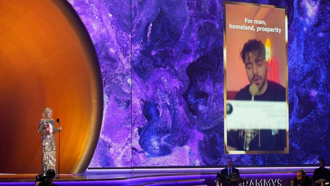 FILE - First lady Jill Biden accepts the award for best song for social change on behalf of Shervin Hajipour for "Baraye" at the 65th annual Grammy Awards, Feb. 5, 2023, in Los Angeles. 