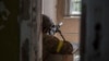 A Ukrainian soldier is in position during heavy fighting on the front line in Severodonetsk, the Luhansk region, Ukraine, June 8, 2022.