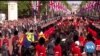 Mourners Line Streets as Queen Elizabeth II Passes on Way to Lie in State

