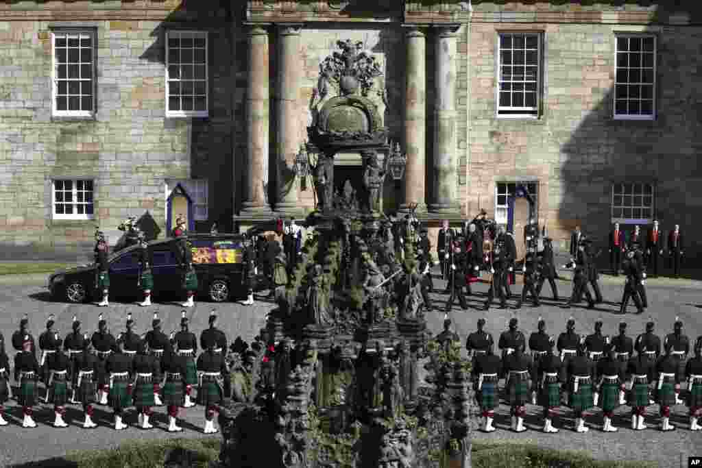 The hearse carrying the coffin of Queen Elizabeth II departs Holyrood Palace, in Edinburgh, Scotland, Sept. 12, 2022. 