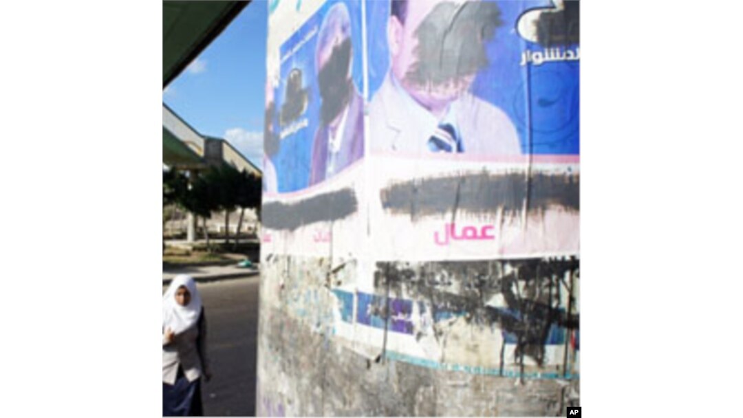 The defacement is being blamed on security forces., Other opposition candidates have also seen their campaign posters marred in Alexandria, Egypt, 22 Nov 2010