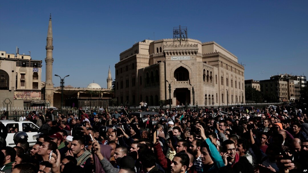 Hundreds chant slogans during a protest after a recent U.S. decision to recognize Jerusalem as the capital of Israel, in Cairo, Egypt, Friday, Dec. 8, 2017. 