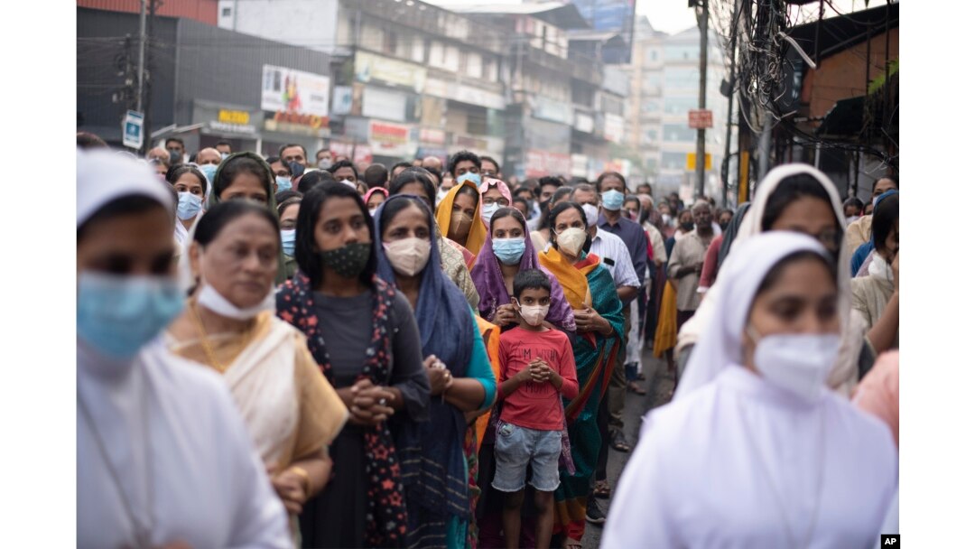 Indian Christians wearing masks as a precaution against COVID-19 gather for prayers as they observe Palm Sunday in Kochi, Kerala state, India, April 10, 2022. (AP Photo/R S Iyer, File)