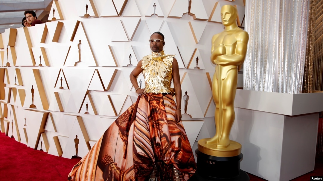 FILE - Billy Porter in Giles Deacon and shoes by Jimmy Choo poses on the red carpet during the Oscars arrivals at the 92nd Academy Awards in Hollywood, Los Angeles, February 9, 2020.
