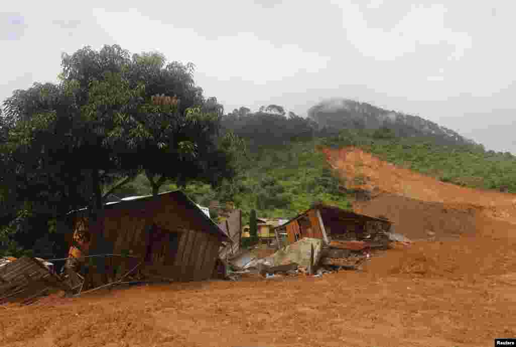 A view of houses destroyed after a mudslide in the village of La Pintada, in the Mexican state of Guerrero, Sept. 19, 2013.