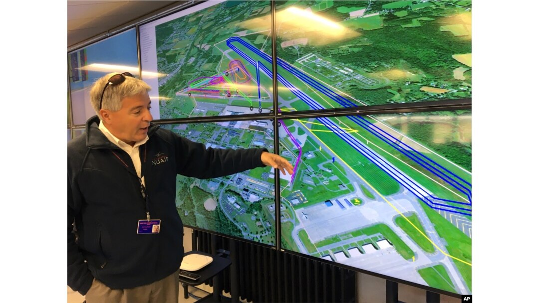 Tony Basile of the Northeast UAS Airspace Integration Research Alliance based at Griffiss International Airport in Rome, N.Y., describes drone test flight paths, Oct. 17, 2017.