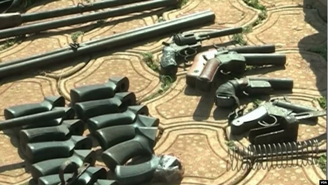FILE - Weapons said to have been seized from separatist fighters are seen displayed in Bamenda, northwestern Cameroon, Feb. 6, 2019. (Moki Edwin Kindzeka/VOA)