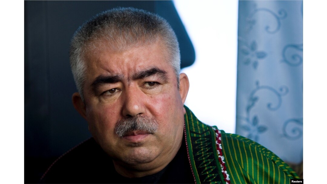 FILE - Abdul Rashid Dostum, who now is Afghanistan's first vice president, speaks during an interview with Reuters in Shibergan, in northern Afghanistan, Aug. 19, 2009.