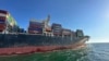 FILE - In this photo provided by Ukraine's Infrastructure Ministry Press Office, container ship Joseph Schulte leaves the port of Odesa to proceed through the corridor established for merchant vessels from Ukraine's Black Sea ports in Odesa, Aug. 16, 2023. 