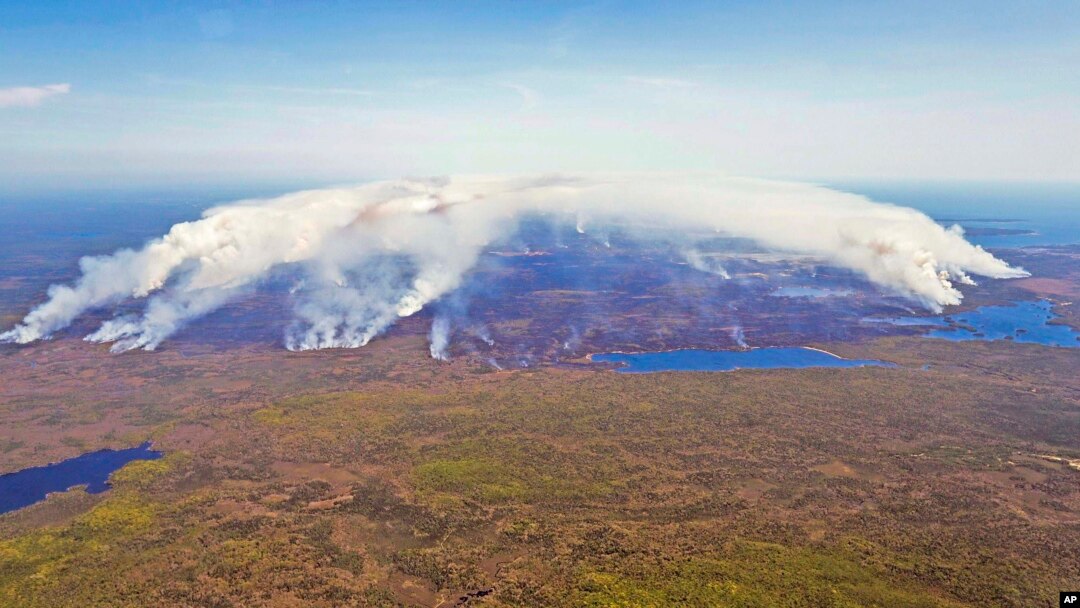 In this aerial image, wildfires burn in Shelburne County, Nova Scotia, on May 31, 2023