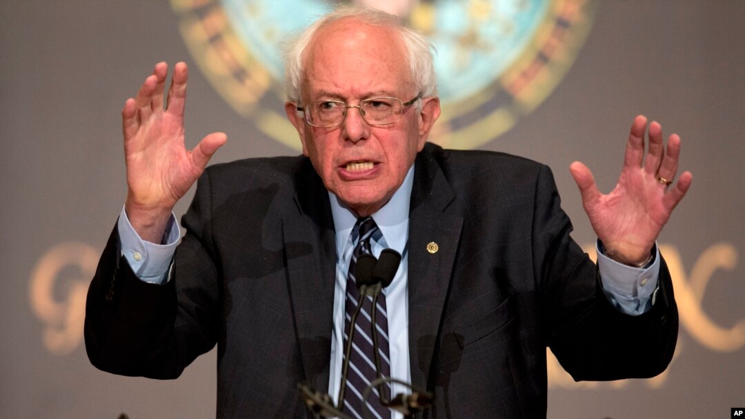 FILE - Democratic presidential candidate Sen. Bernie Sanders, I-Vt., speaks at Georgetown University in Washington. Sanders is a rolling out a plan to slow down the impact of climate change, vowing to cut U.S. carbon emissions, Nov. 19, 2015.