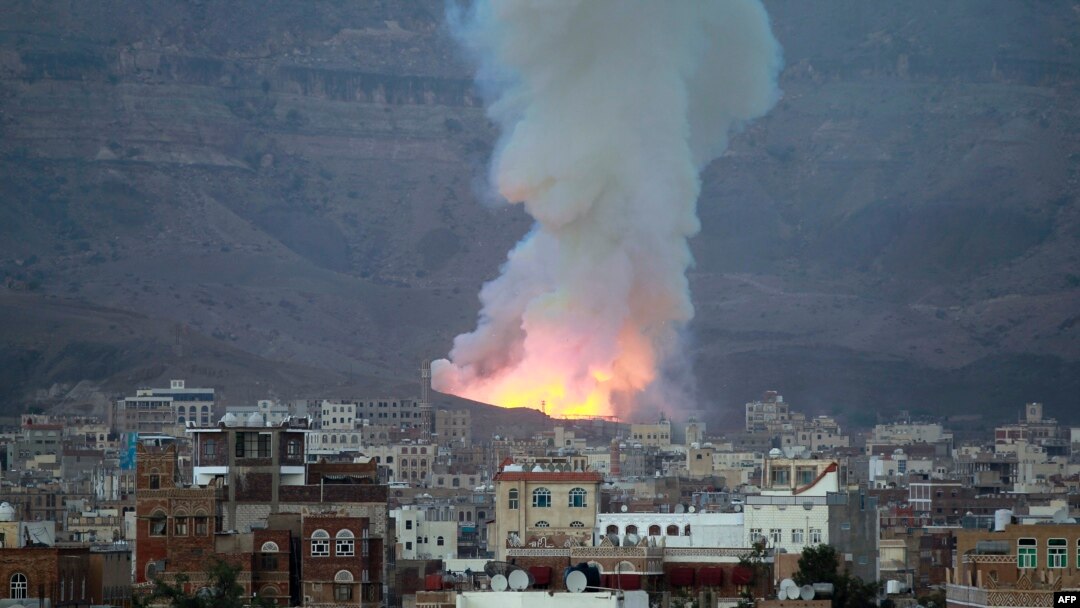 FILE - Smoke billows following an airstrike by the Saudi-led coalition targeting an arms depot in the Mount Noqum area on the eastern outskirts of Sana'a, Yemen, May 11, 2015. 