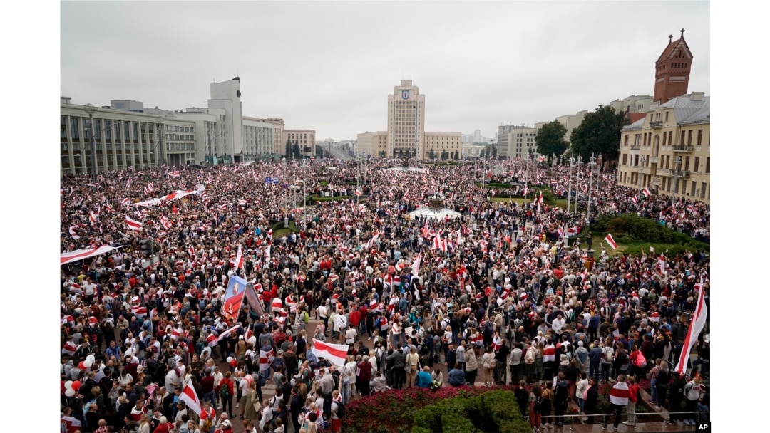 FILE - Belarusian opposition supporters rally in Minsk, Belarus, on Aug. 23, 2020, after President Alexander Lukashenko's disputed reelection victory. In a subsequent crackdown, hundreds of independent media outlets and nongovernmental organizations were closed and outlawed.
