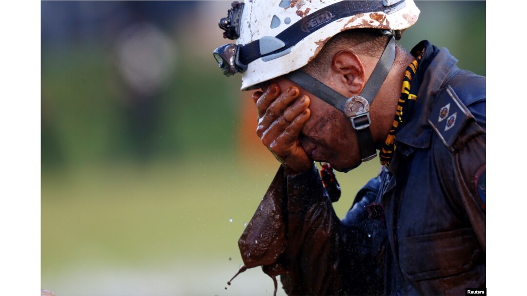 A member of rescue team reacts, upon returning from the mission, after a tailings dam owned by Brazilian mining company Vale SA collapsed, in Brumadinho, Brazil January 27, 2019.