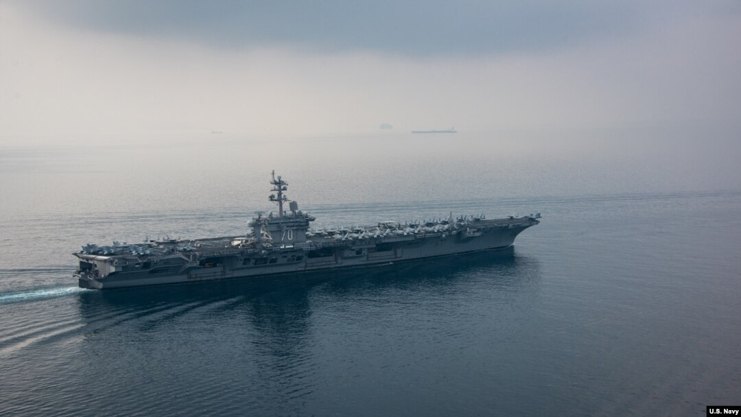 The aircraft carrier USS Carl Vinson (CVN 70) transits the Sunda Strait. The Carl Vinson Carrier Strike Group is on a regularly scheduled Western Pacific deployment.