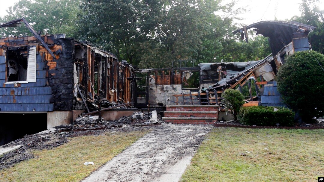 A damaged house on Jefferson Street, in Lawrence, Mass., is seen, Sept. 14, 2018. 