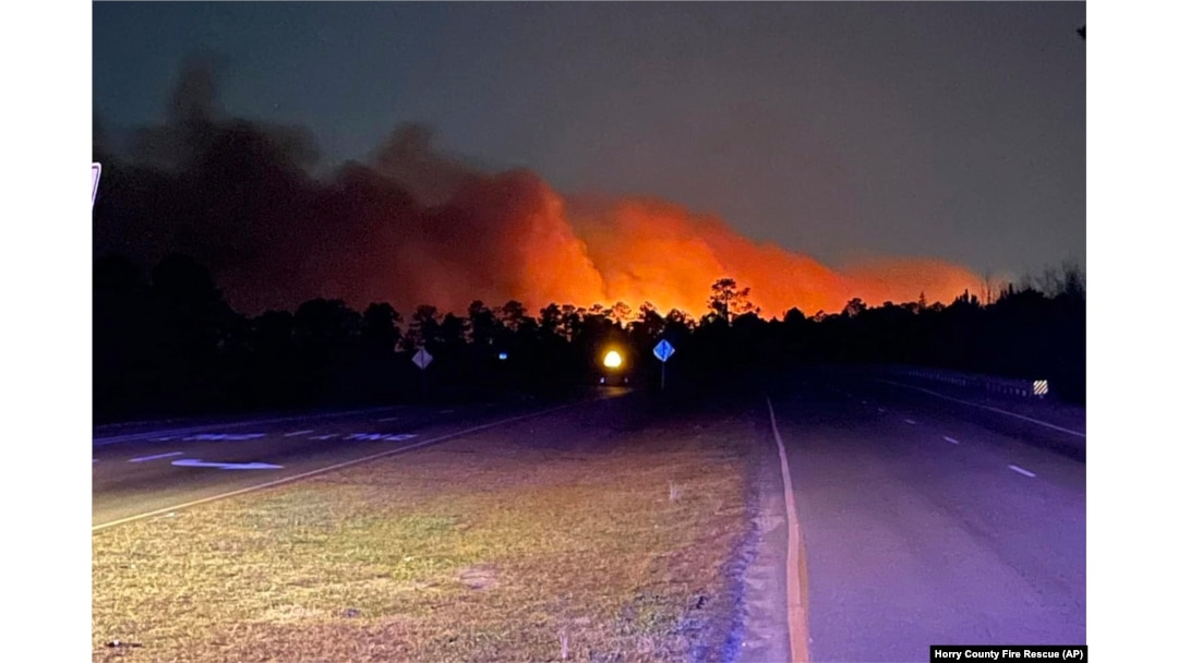 In this photo released by the Horry County Fire Rescue, smoke is seen from fires in Horry County, South Carolina, March 1, 2025.
