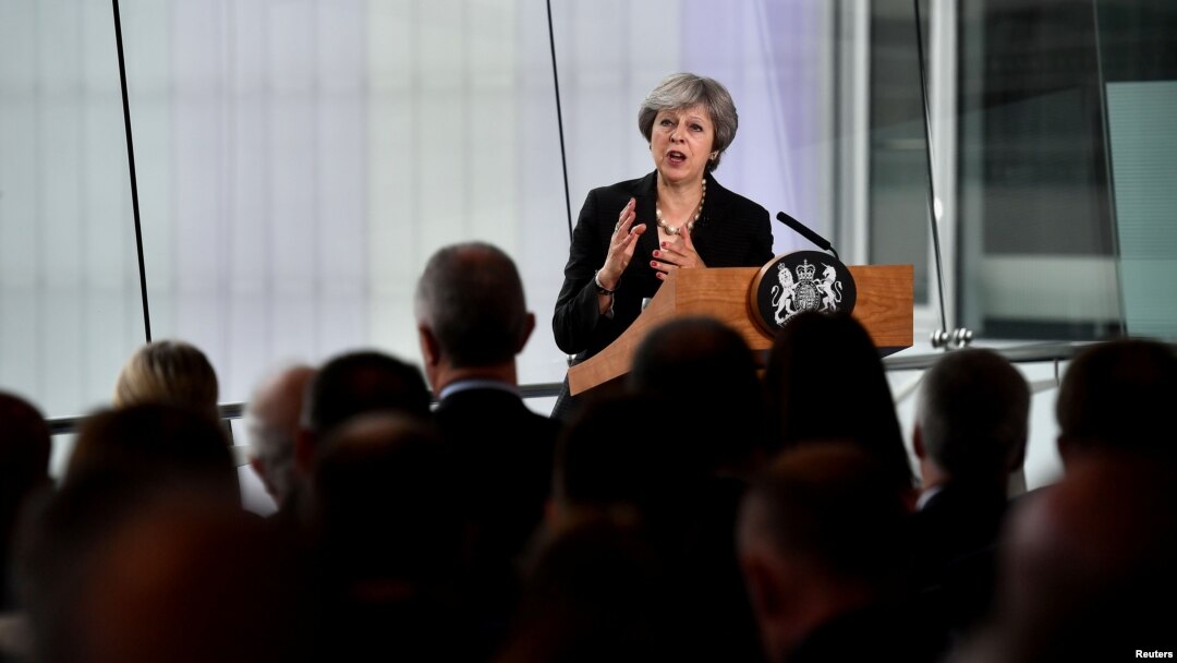 Britain's Prime Minister Theresa May delivers a speech at the Waterfront Hall in Belfast, Northern Ireland, July 20, 2018.