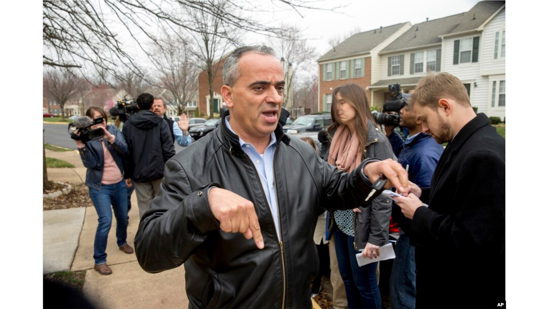Jamal Khweis who identified himself as the father of Mohamad Jamal Khweis, a member of the Islamic State group who gave himself up to Iraqi Kurdish forces in northern Iraq on Monday, outside his home in Alexandria, Va., March 14, 2016.
