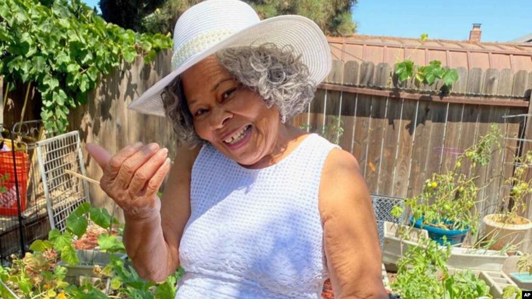 This photo shows Lagetta Wayne, 78, in her garden in Suisun City, Calif., on Aug. 10, 2021. Wayne is among a growing number of “grandfluencers,” folks 70 and up who are making names for themselves on social media. (KiKi Rose via AP)