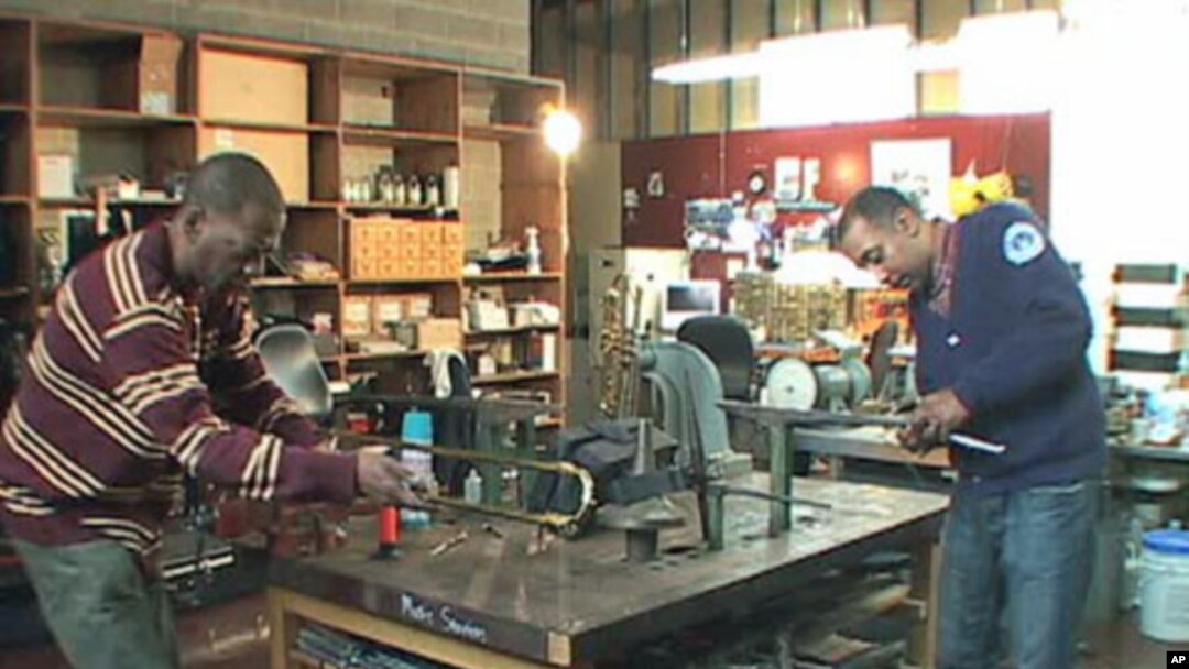 Charles West (left) and Larry Jernigan have been fixing instruments together for almost 20 years.