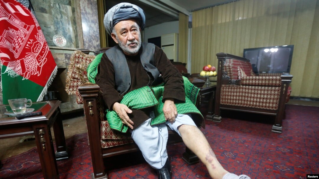 Ahmad Ishchi, who is alleged to have been beaten and detained by officials acting under the authority of Afghanistan's first vice president, Abdul Rashid Dostum, last month, displays an injury on his leg during an interview at his home in Kabul, Afghanistan, Dec. 13, 2016. 