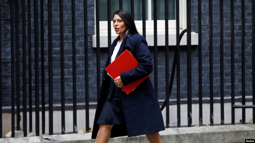 FILE - Priti Patel, Britain's secretary of state for international development arrives in Downing Street, in London, October 31, 2017.