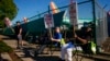 US employers add 12,000 jobs last month as hurricanes, strikes reduce payrolls
