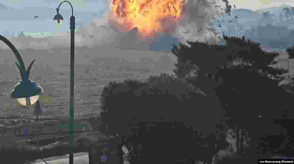 Jeju Air aircraft flight 7C2216 is engulfed in flames as crashes after landing at Muan International Airport in Muan, South Korea, Dec. 29, 2024 in this screengrab obtained from video. 