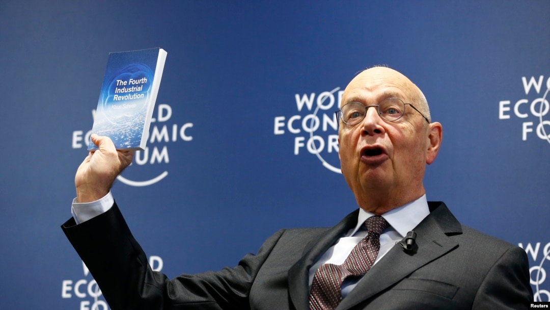 World Economic Forum (WEF) Executive Chairman and founder Klaus Schwab presents his book, 'The Fourth Industrial Revolution,' during a news conference in Cologny, near Geneva, Jan. 13, 2016. 